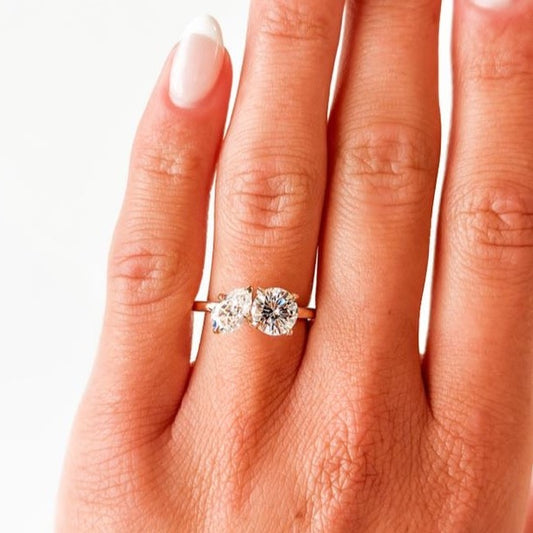 Toi & Moi Pear Shape and Round Moissanite Engagement Ring