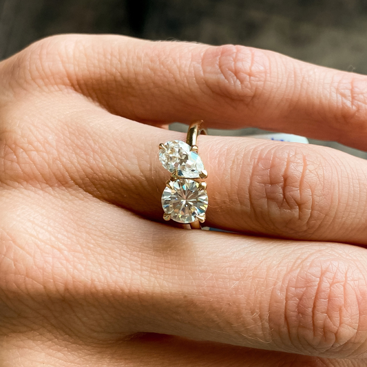 Toi & Moi Pear Shape and Round Moissanite Engagement Ring